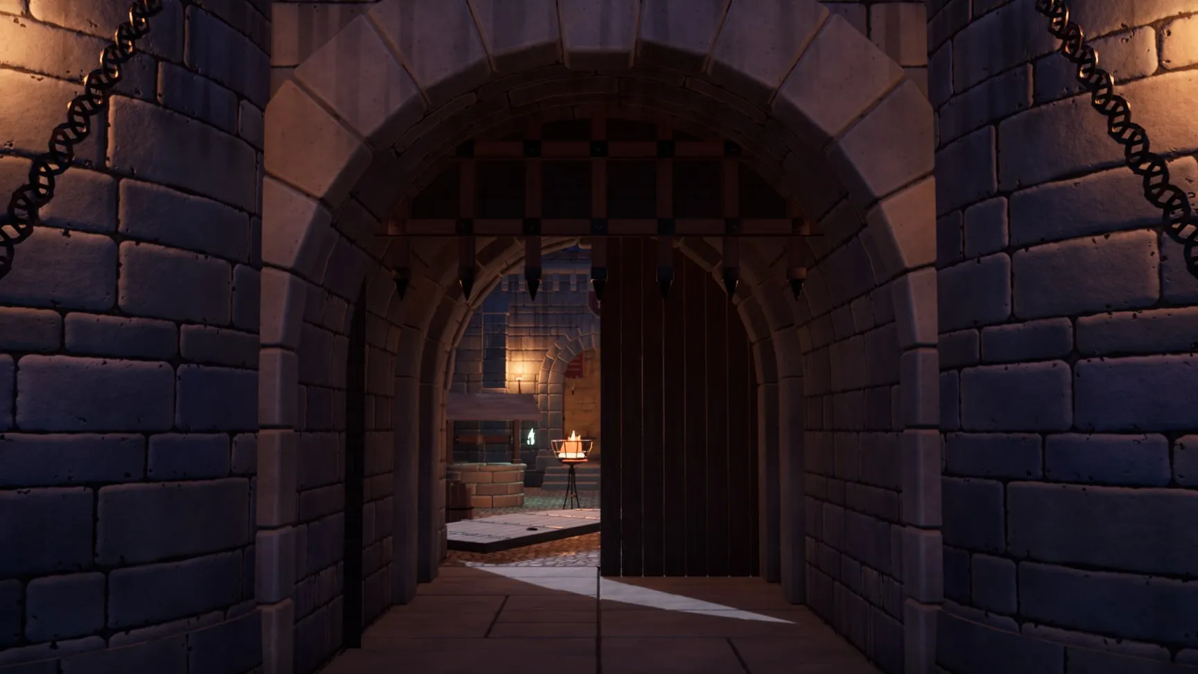 The gate from the bridge, the portcullis jammed half-way