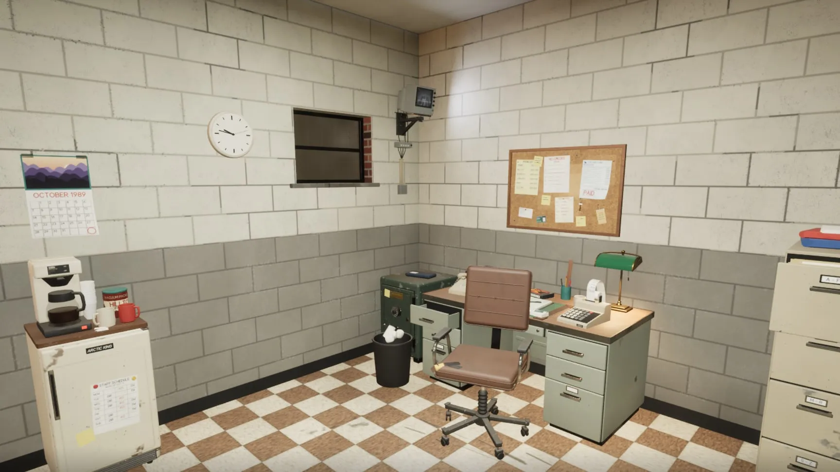 The office with its safe and the CCTV monitor